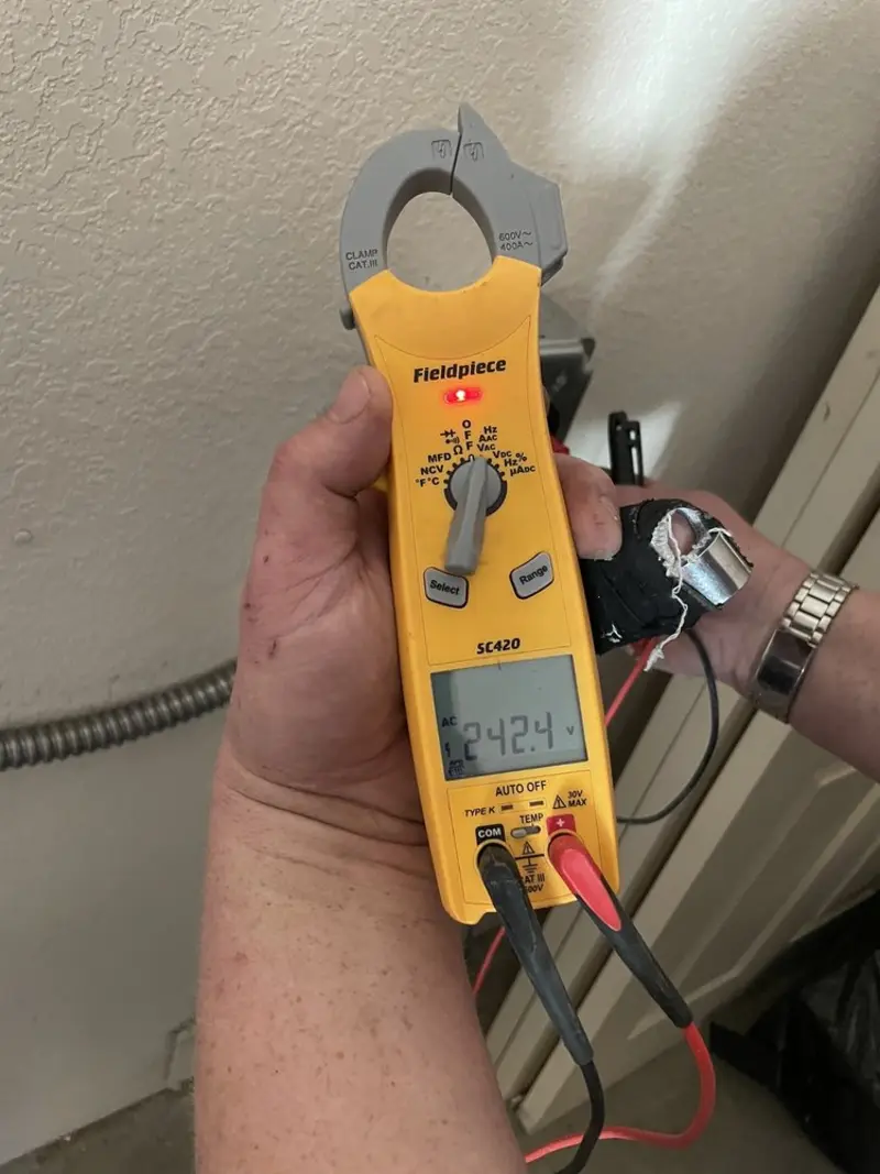 Voltage testing with clamp meter during Generator Installation in Hollister